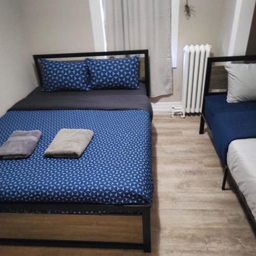 Ένα ή περισσότερα κρεβάτια σε δωμάτιο στο Full Downtown Access-Central Location-Self Checkin