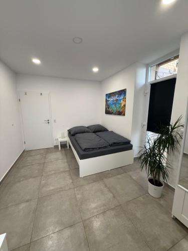 Ένα ή περισσότερα κρεβάτια σε δωμάτιο στο Schönes Zimmer-2 in Stuttgart-Mitte