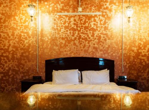 Ένα ή περισσότερα κρεβάτια σε δωμάτιο στο A Heritage Homestay-Aberfoyle Cottage