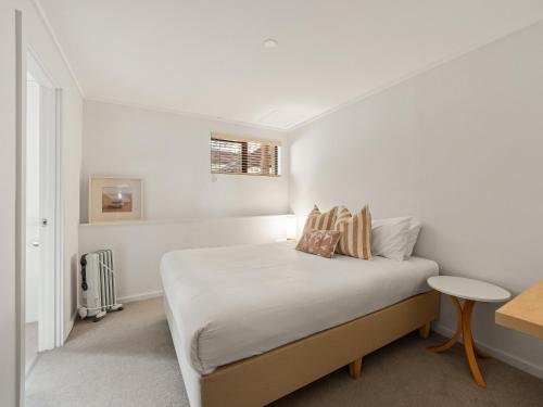 Postel nebo postele na pokoji v ubytování Rosella - Bushland Hideaway