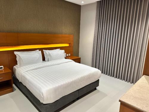 Postel nebo postele na pokoji v ubytování شقق ثري ستار للشقق الفندقية 6