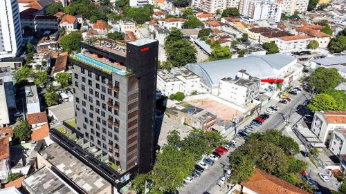 an overhead view of a tall building in a city at Tolive One - Ilha do Leite, Recife in Recife