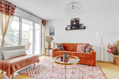 Χώρος καθιστικού στο Elegant appartement proche de l'hippodrome