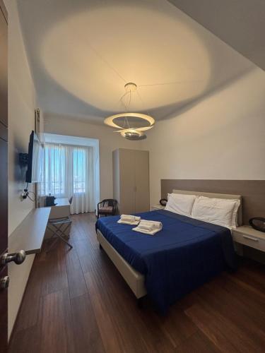 Postel nebo postele na pokoji v ubytování Enjoy Milano Skyline