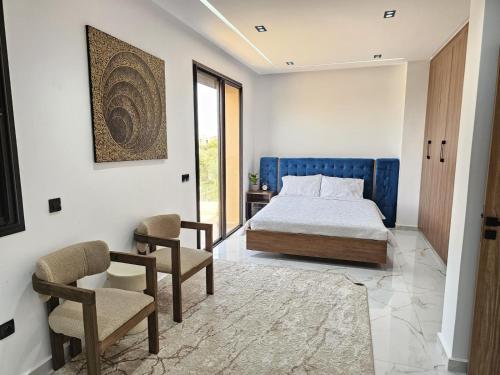 Postel nebo postele na pokoji v ubytování villa Daraa