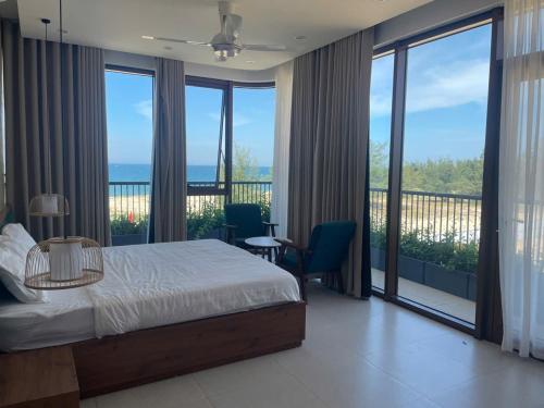 Ένα ή περισσότερα κρεβάτια σε δωμάτιο στο Gió và Cát Cafe & Homestay