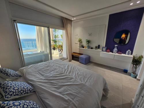 Postel nebo postele na pokoji v ubytování Bella view oceans art