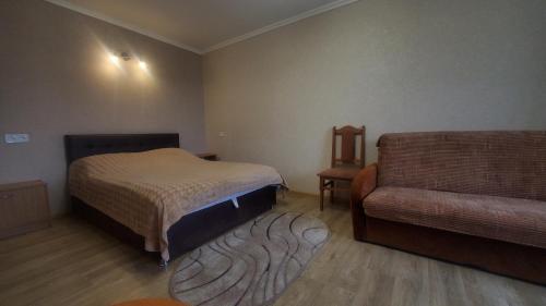 Postel nebo postele na pokoji v ubytování Новая квартира-апартаменты в центре