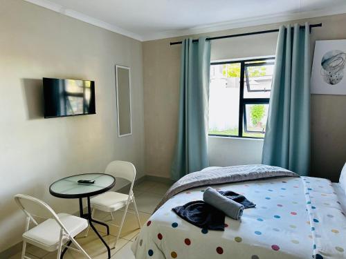 Ένα ή περισσότερα κρεβάτια σε δωμάτιο στο StayAT62