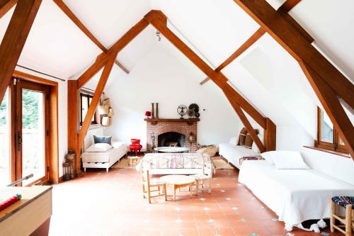 Una cama o camas en una habitación de Le Paddock by Ernesst