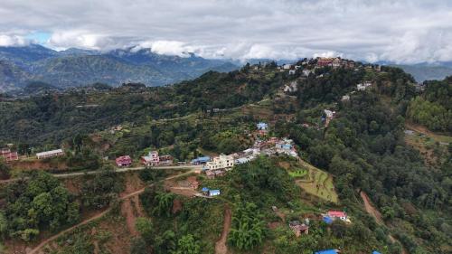 an aerial view of a village on a mountain at Namaste Home Stay in Dhulikhel