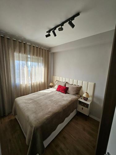 Postel nebo postele na pokoji v ubytování Apartamento 5km de Alphaville com estacionamento