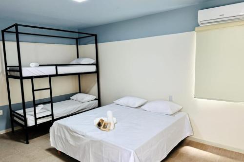 Giường trong phòng chung tại Muira Stay Belém Hostel