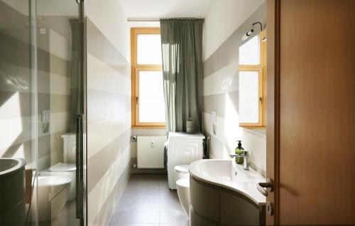 Koupelna v ubytování Cave Holiday Apartment