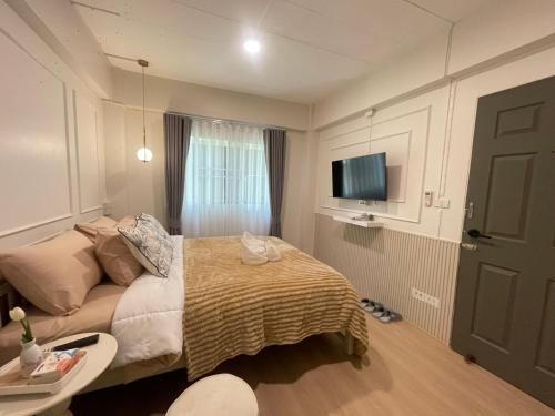 TV a/nebo společenská místnost v ubytování Mari Home