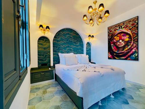 Postel nebo postele na pokoji v ubytování Riad Kaya