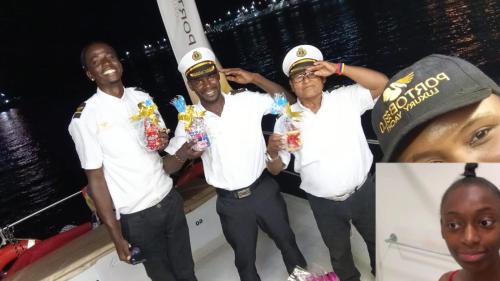 a group of men posing for a picture on a boat at Yate PORTOBELO LUXURY in Buenaventura