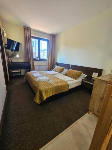 Postel nebo postele na pokoji v ubytování Apartment ZAX B7 in Terra Complex