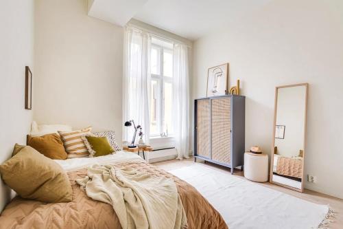 Ένα ή περισσότερα κρεβάτια σε δωμάτιο στο Modern 3BR Apartment in Oslo City Center