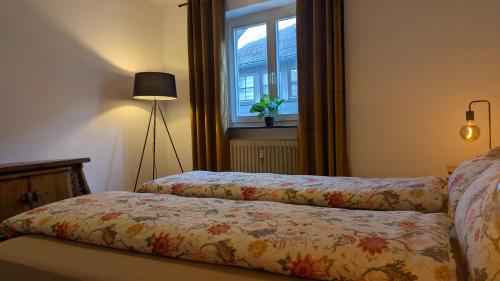 Postel nebo postele na pokoji v ubytování Herzstück