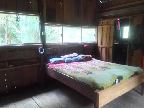 Voodi või voodid majutusasutuse Sítio do guerreiro toas