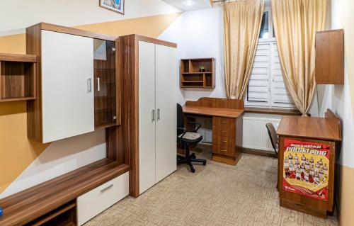 Ένα ή περισσότερα κρεβάτια σε δωμάτιο στο Apartament LUX Franciszkańska, Przemyśl