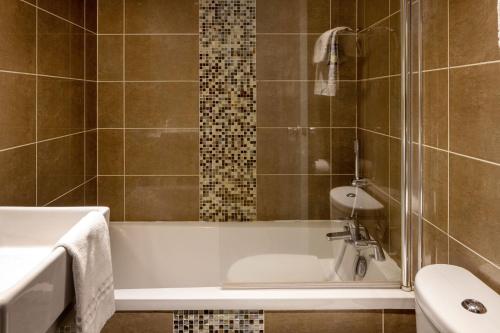 Koupelna v ubytování Hotel Victoria