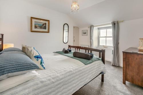 Voodi või voodid majutusasutuse Samphire Cottage toas