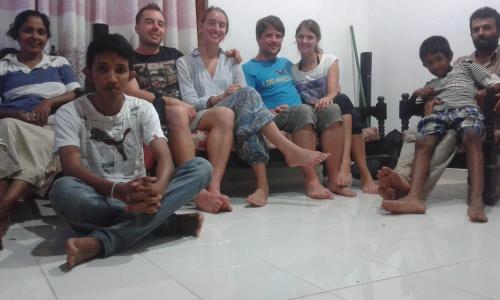 a group of people sitting on the floor at Jayaru Guest House in Polonnaruwa