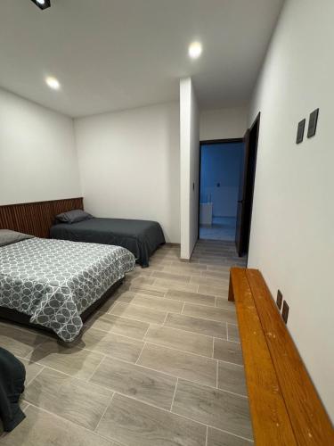 Postel nebo postele na pokoji v ubytování Casa Barcelona