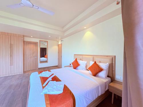 Postel nebo postele na pokoji v ubytování GLD Weve-Premium Flag Beach #Comfort Room Near Temple & Puri Beach