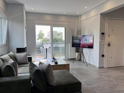 TV a/nebo společenská místnost v ubytování Allure villa