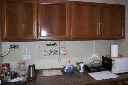 Dapur atau dapur kecil di Premium apartment Section A