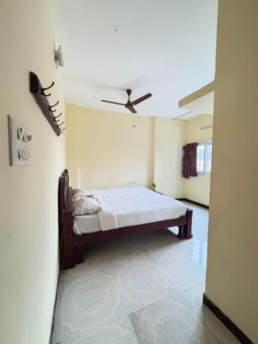 Ένα ή περισσότερα κρεβάτια σε δωμάτιο στο The grand vista