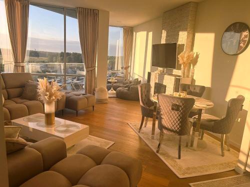 Posezení v ubytování BlueSeaPearl apartamentai Palanga, Šventoji