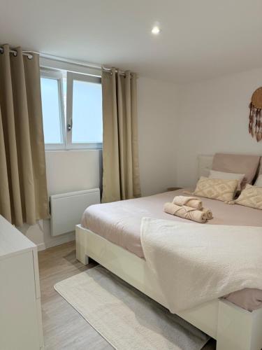 Postel nebo postele na pokoji v ubytování Family & Sea Ouistreham - Entre mer, centre et bourg