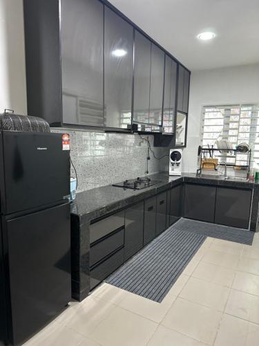 Η κουζίνα ή μικρή κουζίνα στο PakyaZ Homestay