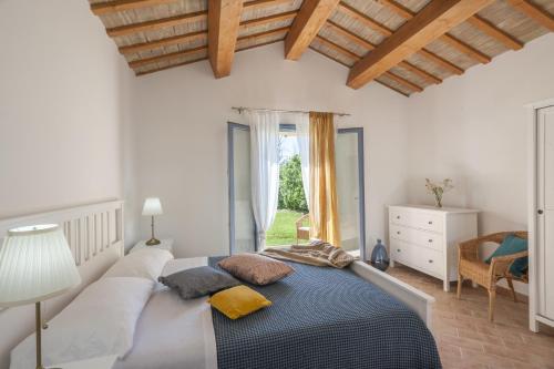 Postel nebo postele na pokoji v ubytování Villa Elettra 12&2 by Marche Holiday Villas