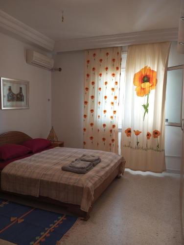 Ένα ή περισσότερα κρεβάτια σε δωμάτιο στο Room Flower Near Airport