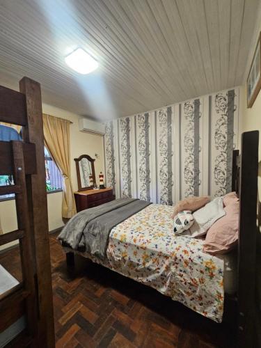 Postel nebo postele na pokoji v ubytování Casa Frente Mar - Penha - 5km do Beto Carrero