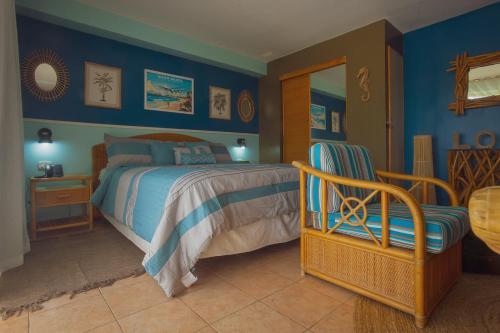 Ένα ή περισσότερα κρεβάτια σε δωμάτιο στο Optimum Oasis - Royal Retreats at Maho Beach Studio