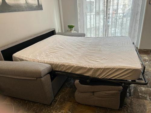 Postel nebo postele na pokoji v ubytování Apartamento en centro ciudad con garaje y aire acondicionado