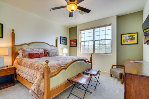 a bedroom with a bed and a ceiling fan at Sunny Adobe Retreat with Hot Tub and Mtn Views! in Tubac