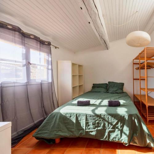 Postel nebo postele na pokoji v ubytování Les Toits d'Aix - Hyper center - Cours Mirabeau - Lumineux