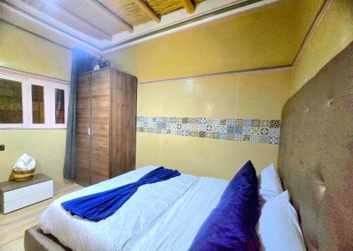 Кровать или кровати в номере 1-Bedroom Apartment with Garden & Wi-Fi in Taroudant City