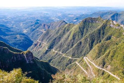 a view of a mountain with a road on it at Hostel Maria Fumaça in Louro Müller
