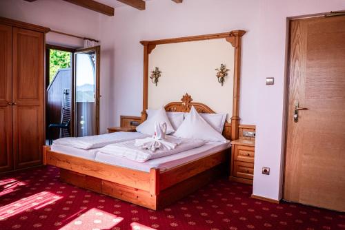 Postel nebo postele na pokoji v ubytování Hotel Tannhof