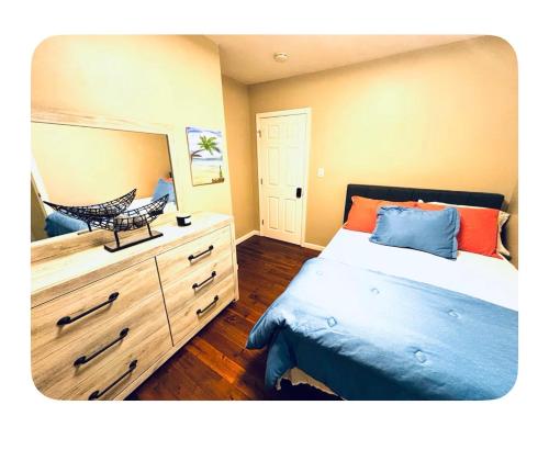 Ένα ή περισσότερα κρεβάτια σε δωμάτιο στο Jersey Oasis