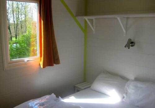 Ένα ή περισσότερα κρεβάτια σε δωμάτιο στο Camping La Motte