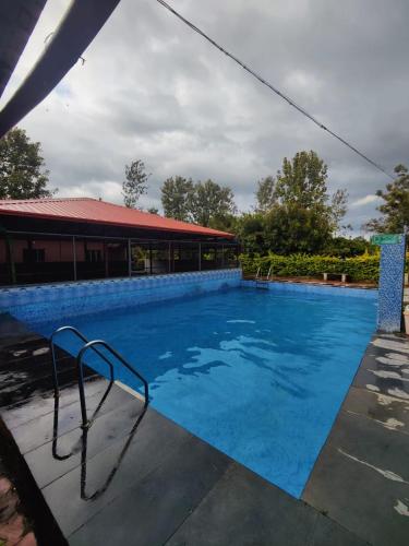 Πισίνα στο ή κοντά στο Lakshmi Homestay